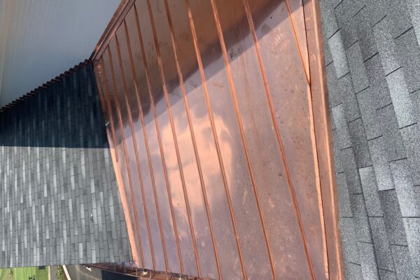 Standing Seam copper roof, valleys, gutters and flashing
